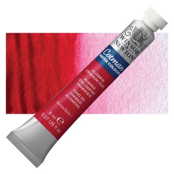 A single Alizarin Crimson Hue Winsor and Newton Cotman Watercolour 8ml Tube is shown diagonally across the frame. The back of the tube is facing the bottom left hand corner of the frame and the lid of the tube is facing the top, right hand corner of the frame. The tube is silver and the Winsor and Newton logo is printed at the top of the tube. There is a blue band below the logo and the words 'Cotman Watercolour' are printed on the blue band in white. Then there is a large colour band around the base of the tube that denotes the colour of the paint. The tube colour and paint properties are indicated on this colour band in black text. The tube has a white, plastic screw on cap. There is a rectangular colour swatch behind the tube that shows how the colour works on a gradient scale. The entire image is center of the frame and on a white background.