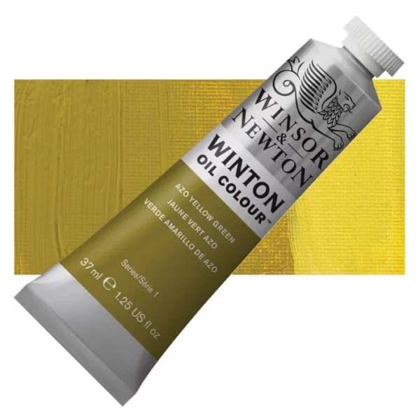 A tube of Azo Yellow Green Winsor and Newton Winton Oil Paint 37ml is shown diagonally, across the center of the frame. The tube is a silver colour and has a white screw on, plastic lid. The Winsor and Newton logo is printed at the top of the tube and there is a white band printed across the tube, below the logo, that has the words 'Winton Oil Colour' written on it. Below that is a colour band printed across the tube that has black text describing the product colour and paint properties. There is a rectangular colour swatch behind the tube that shows the colour of the paint. It lays horizontally across the top third of the frame. The image is center of the frame and on a white background.