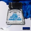 A single bottle of Blue Winsor & Newton Drawing Ink can be seen in the center of the frame, with ink in the background, in the top right hand corner of the frame, flowing into the frame. The ink is the colour of the ink inside the bottle. The bottle is a clear glass bottle and so you can see the colour of the ink inside. There is a black, plastic screw on lid and a label stuck to the front of the bottle with the brand name and logo on it. There is a small rectangular colour block with a sample of the ink colour in a 1:1 ratio, in the bottom right hand corner of the frame.