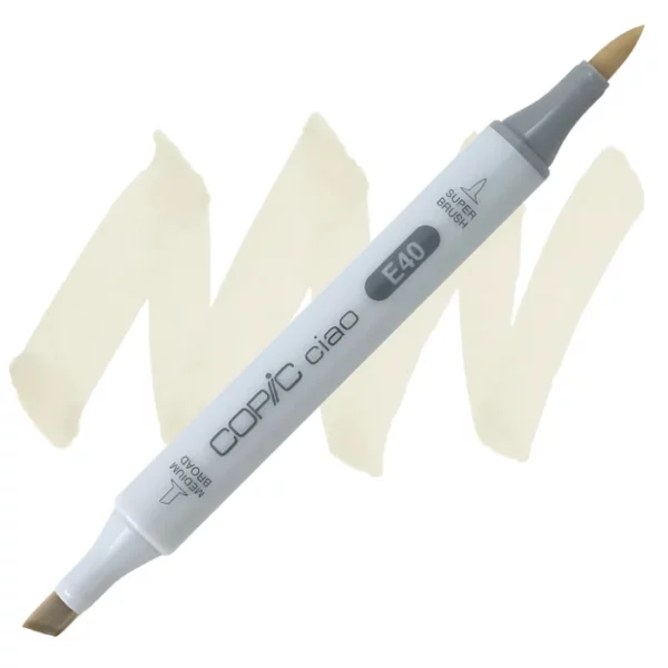 in the center of the image is a single copic marker that is sitting diagonally across the image. from left to right. it has a grey body and both caps are off showing the two different nibs, one brush at the top and the chisel tip at the bottom. it is sitting infront of a squiggle of the same colour as the marker on a white background