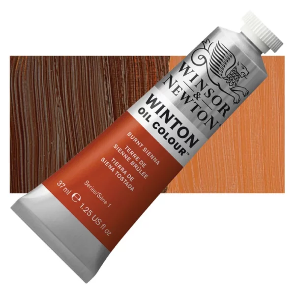 A tube of Burnt Sienna Winsor and Newton Winton Oil Paint 37ml is shown diagonally, across the center of the frame. The tube is a silver colour and has a white screw on, plastic lid. The Winsor and Newton logo is printed at the top of the tube and there is a white band printed across the tube, below the logo, that has the words 'Winton Oil Colour' written on it. Below that is a colour band printed across the tube that has black text describing the product colour and paint properties. There is a rectangular colour swatch behind the tube that shows the colour of the paint. It lays horizontally across the top third of the frame. The image is center of the frame and on a white background.