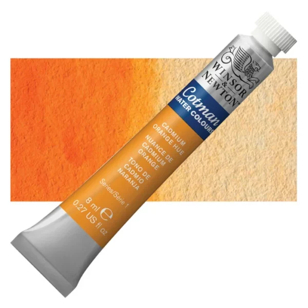 A single Cadmium Orange Hue Winsor and Newton Cotman Watercolour 8ml Tube is shown diagonally across the frame. The back of the tube is facing the bottom left hand corner of the frame and the lid of the tube is facing the top, right hand corner of the frame. The tube is silver and the Winsor and Newton logo is printed at the top of the tube. There is a blue band below the logo and the words 'Cotman Watercolour' are printed on the blue band in white. Then there is a large colour band around the base of the tube that denotes the colour of the paint. The tube colour and paint properties are indicated on this colour band in black text. The tube has a white, plastic screw on cap. There is a rectangular colour swatch behind the tube that shows how the colour works on a gradient scale. The entire image is center of the frame and on a white background.