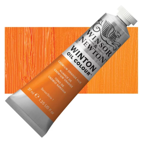 A tube of Cadmium Orange Hue Winsor and Newton Winton Oil Paint 37ml is shown diagonally, across the center of the frame. The tube is a silver colour and has a white screw on, plastic lid. The Winsor and Newton logo is printed at the top of the tube and there is a white band printed across the tube, below the logo, that has the words 'Winton Oil Colour' written on it. Below that is a colour band printed across the tube that has black text describing the product colour and paint properties. There is a rectangular colour swatch behind the tube that shows the colour of the paint. It lays horizontally across the top third of the frame. The image is center of the frame and on a white background.