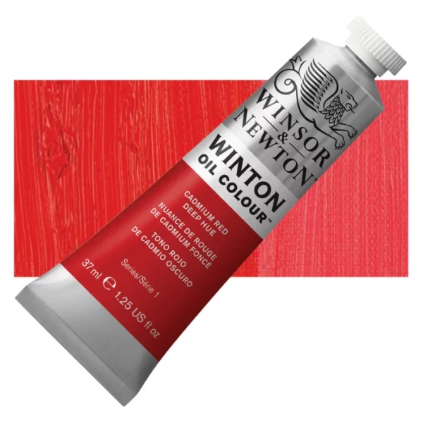 A tube of Cadmium Red Deep Hue Winsor and Newton Winton Oil Paint 37ml is shown diagonally, across the center of the frame. The tube is a silver colour and has a white screw on, plastic lid. The Winsor and Newton logo is printed at the top of the tube and there is a white band printed across the tube, below the logo, that has the words 'Winton Oil Colour' written on it. Below that is a colour band printed across the tube that has black text describing the product colour and paint properties. There is a rectangular colour swatch behind the tube that shows the colour of the paint. It lays horizontally across the top third of the frame. The image is center of the frame and on a white background.