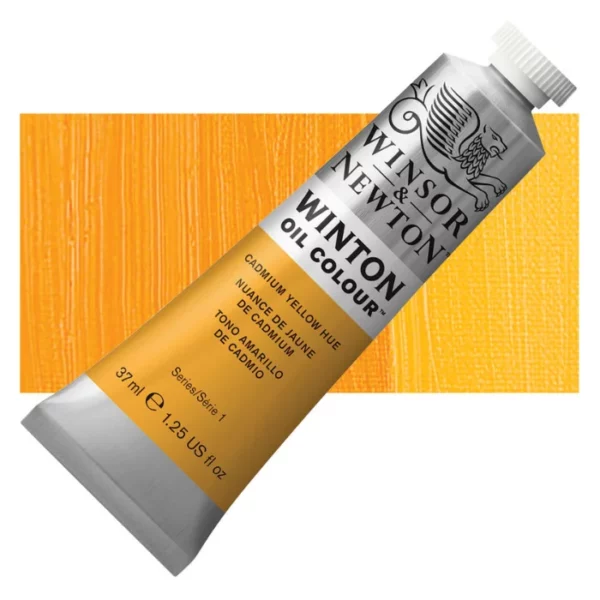 A tube of Cadmium Yellow Hue Winsor and Newton Winton Oil Paint 37ml is shown diagonally, across the center of the frame. The tube is a silver colour and has a white screw on, plastic lid. The Winsor and Newton logo is printed at the top of the tube and there is a white band printed across the tube, below the logo, that has the words 'Winton Oil Colour' written on it. Below that is a colour band printed across the tube that has black text describing the product colour and paint properties. There is a rectangular colour swatch behind the tube that shows the colour of the paint. It lays horizontally across the top third of the frame. The image is center of the frame and on a white background.