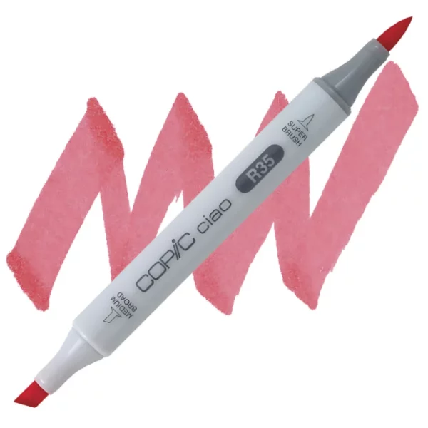 in the center of the image is a single copic marker that is sitting diagonally across the image. from left to right. it has a grey body and both caps are off showing the two different nibs, one brush at the top and the chisel tip at the bottom. it is sitting infront of a squiggle of the same colour as the marker on a white background