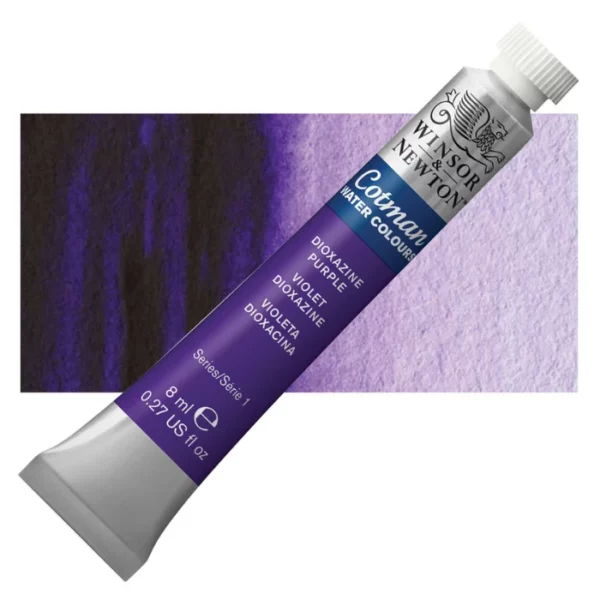 A single Dioxazine Purple Winsor and Newton Cotman Watercolour 8ml Tube is shown diagonally across the frame. The back of the tube is facing the bottom left hand corner of the frame and the lid of the tube is facing the top, right hand corner of the frame. The tube is silver and the Winsor and Newton logo is printed at the top of the tube. There is a blue band below the logo and the words 'Cotman Watercolour' are printed on the blue band in white. Then there is a large colour band around the base of the tube that denotes the colour of the paint. The tube colour and paint properties are indicated on this colour band in black text. The tube has a white, plastic screw on cap. There is a rectangular colour swatch behind the tube that shows how the colour works on a gradient scale. The entire image is center of the frame and on a white background.