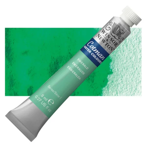 A single Emerald Winsor and Newton Cotman Watercolour 8ml Tube is shown diagonally across the frame. The back of the tube is facing the bottom left hand corner of the frame and the lid of the tube is facing the top, right hand corner of the frame. The tube is silver and the Winsor and Newton logo is printed at the top of the tube. There is a blue band below the logo and the words 'Cotman Watercolour' are printed on the blue band in white. Then there is a large colour band around the base of the tube that denotes the colour of the paint. The tube colour and paint properties are indicated on this colour band in black text. The tube has a white, plastic screw on cap. There is a rectangular colour swatch behind the tube that shows how the colour works on a gradient scale. The entire image is center of the frame and on a white background.