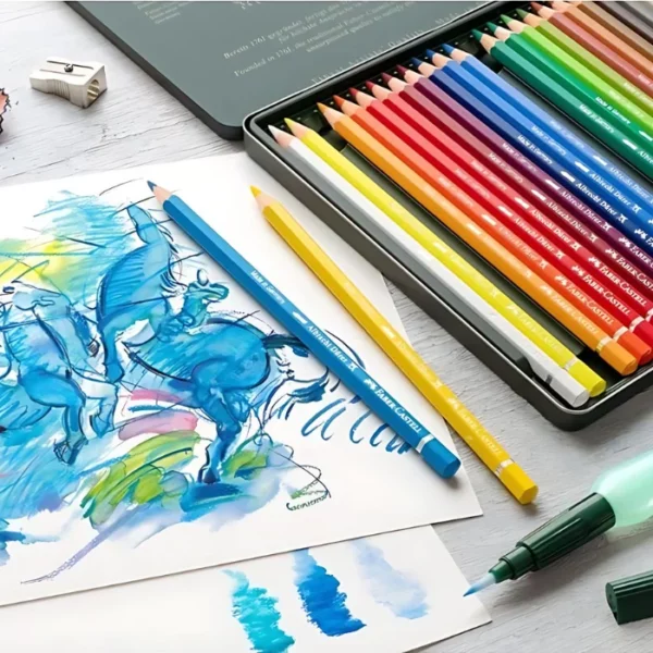 A promotional image for Faber Castell Albrecht Durer Water Colour Pencils. It is a close up image that is cut off by the frame. A set of pencils can be seen coming in from the top right hand corner of the frame and some loose papers with pencil drawings to the left of it with loose pencils scattered around.