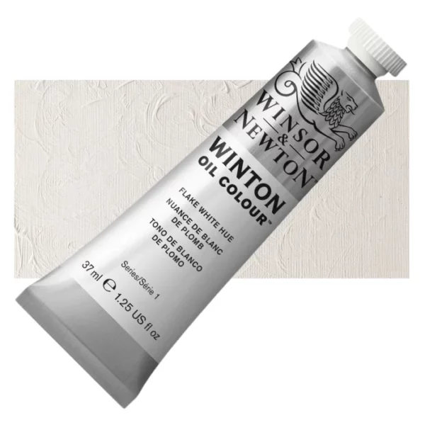 A tube of Flake White Hue Winsor and Newton Winton Oil Paint 37ml is shown diagonally, across the center of the frame. The tube is a silver colour and has a white screw on, plastic lid. The Winsor and Newton logo is printed at the top of the tube and there is a white band printed across the tube, below the logo, that has the words 'Winton Oil Colour' written on it. Below that is a colour band printed across the tube that has black text describing the product colour and paint properties. There is a rectangular colour swatch behind the tube that shows the colour of the paint. It lays horizontally across the top third of the frame. The image is center of the frame and on a white background.