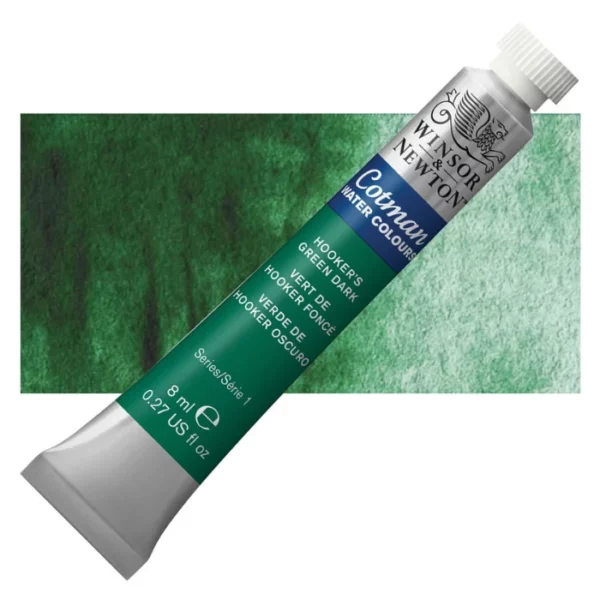 A single Hookers Green Dark Winsor and Newton Cotman Watercolour 8ml Tube is shown diagonally across the frame. The back of the tube is facing the bottom left hand corner of the frame and the lid of the tube is facing the top, right hand corner of the frame. The tube is silver and the Winsor and Newton logo is printed at the top of the tube. There is a blue band below the logo and the words 'Cotman Watercolour' are printed on the blue band in white. Then there is a large colour band around the base of the tube that denotes the colour of the paint. The tube colour and paint properties are indicated on this colour band in black text. The tube has a white, plastic screw on cap. There is a rectangular colour swatch behind the tube that shows how the colour works on a gradient scale. The entire image is center of the frame and on a white background.