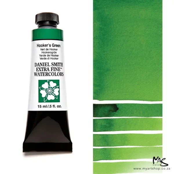 A tube of Hookers Green S1 Daniel Smith Watercolour Paint is shown in the frame, to the left hand side of the frame vertically. The tube has a black plastic cap and a black base. The center of the tube is white and there is a colour band at the top of the tube, below the cap, that indicates the colour of the paint. There is black text on the front of the tube with the brand name and logo. To the right of the tube is a colour swatch which was made using the paint. In the colour swatch, you can see the paint undiluted and in a diluted form. The image is on a white background and is center of the frame.