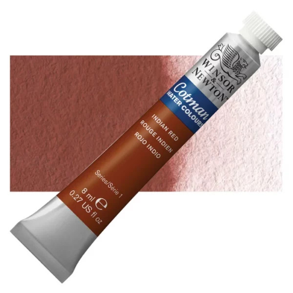 A single Indian Red Winsor and Newton Cotman Watercolour 8ml Tube is shown diagonally across the frame. The back of the tube is facing the bottom left hand corner of the frame and the lid of the tube is facing the top, right hand corner of the frame. The tube is silver and the Winsor and Newton logo is printed at the top of the tube. There is a blue band below the logo and the words 'Cotman Watercolour' are printed on the blue band in white. Then there is a large colour band around the base of the tube that denotes the colour of the paint. The tube colour and paint properties are indicated on this colour band in black text. The tube has a white, plastic screw on cap. There is a rectangular colour swatch behind the tube that shows how the colour works on a gradient scale. The entire image is center of the frame and on a white background.