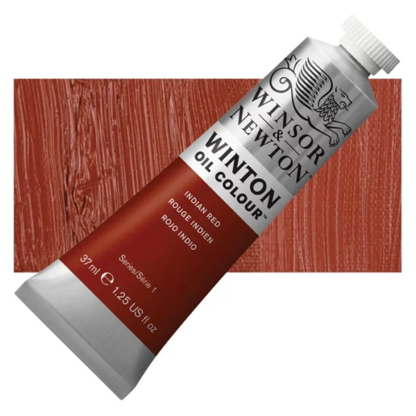 A tube of Indian Red Winsor and Newton Winton Oil Paint 37ml is shown diagonally, across the center of the frame. The tube is a silver colour and has a white screw on, plastic lid. The Winsor and Newton logo is printed at the top of the tube and there is a white band printed across the tube, below the logo, that has the words 'Winton Oil Colour' written on it. Below that is a colour band printed across the tube that has black text describing the product colour and paint properties. There is a rectangular colour swatch behind the tube that shows the colour of the paint. It lays horizontally across the top third of the frame. The image is center of the frame and on a white background.