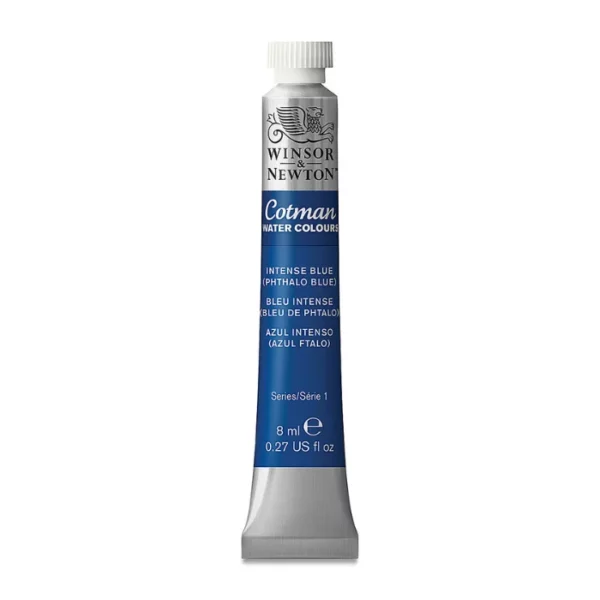 A single Intense Phthalo Blue Winsor and Newton Cotman Watercolour 8ml Tube is shown vertically in the center of the frame. The tube is silver and the Winsor and Newton logo is printed at the top of the tube. There is a blue band below the logo and the words 'Cotman Watercolour' are printed on the blue band in white. Then there is a large colour band around the base of the tube that denotes the colour of the paint. The tube colour and paint properties are indicated on this colour band in black text. The tube has a white, plastic screw on cap. The image is center of the frame and on a white background.