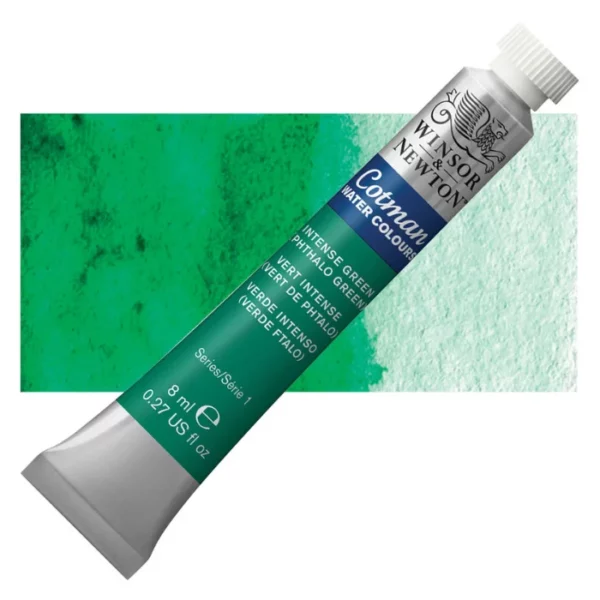 A single Intense Phthalo Green Winsor and Newton Cotman Watercolour 8ml Tube is shown diagonally across the frame. The back of the tube is facing the bottom left hand corner of the frame and the lid of the tube is facing the top, right hand corner of the frame. The tube is silver and the Winsor and Newton logo is printed at the top of the tube. There is a blue band below the logo and the words 'Cotman Watercolour' are printed on the blue band in white. Then there is a large colour band around the base of the tube that denotes the colour of the paint. The tube colour and paint properties are indicated on this colour band in black text. The tube has a white, plastic screw on cap. There is a rectangular colour swatch behind the tube that shows how the colour works on a gradient scale. The entire image is center of the frame and on a white background.