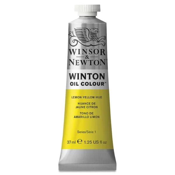 A single tube of Lemon Yellow Hue Winsor and Newton Winton Oil Paint 37ml is shown in the center of the frame, standing vertically. The tube is a silver colour and has a white screw on, plastic lid. The Winsor and Newton logo is printed at the top of the tube and there is a white band across the tube, under the logo, with the words, 'Winton Oil Colour'. There is a band of colour below that which denotes the colour of the paint in the tube. There is text on this colour band, describing the colour and paint properties. The image is center of the frame and on a white background.