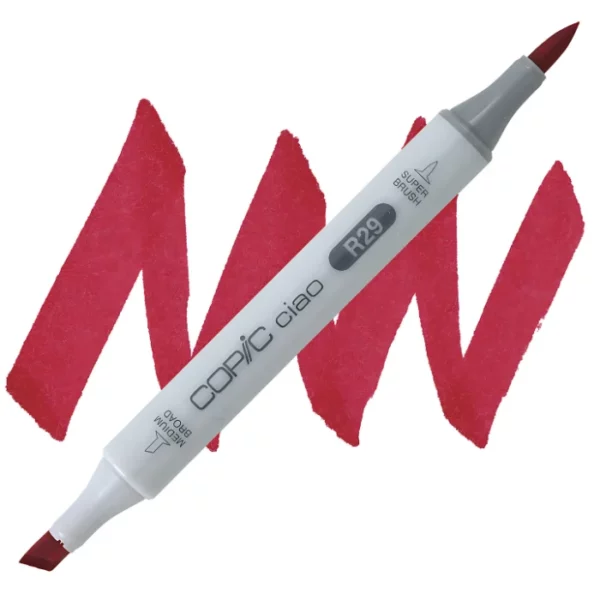 in the center of the image is a single copic marker that is sitting diagonally across the image. from left to right. it has a grey body and both caps are off showing the two different nibs, one brush at the top and the chisel tip at the bottom. it is sitting infront of a squiggle of the same colour as the marker on a white background