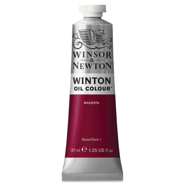 A single tube of Magenta Winsor and Newton Winton Oil Paint 37ml is shown in the center of the frame, standing vertically. The tube is a silver colour and has a white screw on, plastic lid. The Winsor and Newton logo is printed at the top of the tube and there is a white band across the tube, under the logo, with the words, 'Winton Oil Colour'. There is a band of colour below that which denotes the colour of the paint in the tube. There is text on this colour band, describing the colour and paint properties. The image is center of the frame and on a white background.