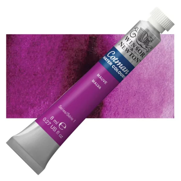 A single Mauve Winsor and Newton Cotman Watercolour 8ml Tube is shown diagonally across the frame. The back of the tube is facing the bottom left hand corner of the frame and the lid of the tube is facing the top, right hand corner of the frame. The tube is silver and the Winsor and Newton logo is printed at the top of the tube. There is a blue band below the logo and the words 'Cotman Watercolour' are printed on the blue band in white. Then there is a large colour band around the base of the tube that denotes the colour of the paint. The tube colour and paint properties are indicated on this colour band in black text. The tube has a white, plastic screw on cap. There is a rectangular colour swatch behind the tube that shows how the colour works on a gradient scale. The entire image is center of the frame and on a white background.