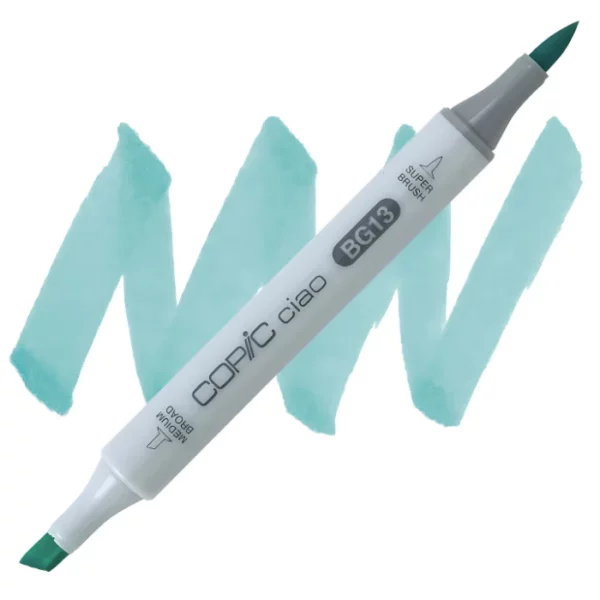 in the center of the image is a single copic marker that is sitting diagonally across the image. from left to right. it has a grey body and both caps are off showing the two different nibs, one brush at the top and the chisel tip at the bottom. it is sitting infront of a squiggle of the same colour as the marker on a white background