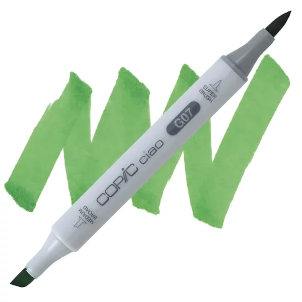 in the center of the image is a single copic marker that is sitting diagonally across the image. from left to right. it has a grey body and both caps are off showing the two different nibs, one brush at the top and the chisel tip at the bottom. it is sitting infront of a squiggle of the same colour as the marker on a white background