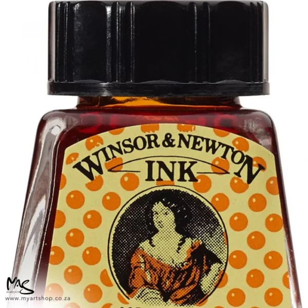 A close up of a single bottle of Orange Winsor & Newton Drawing Ink. The bottom of the bottle is cut off by the frame. The bottle is clear glass so you can see the colour of the ink inside, with a black screw on plastic lid. There is a label on the front of the bottle with the brand logo.