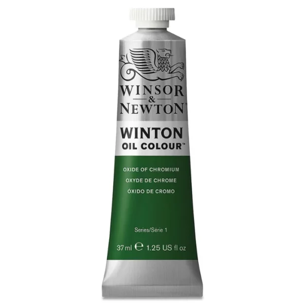 A single tube of Oxide Of Chromium Winsor and Newton Winton Oil Paint 37ml is shown in the center of the frame, standing vertically. The tube is a silver colour and has a white screw on, plastic lid. The Winsor and Newton logo is printed at the top of the tube and there is a white band across the tube, under the logo, with the words, 'Winton Oil Colour'. There is a band of colour below that which denotes the colour of the paint in the tube. There is text on this colour band, describing the colour and paint properties. The image is center of the frame and on a white background.