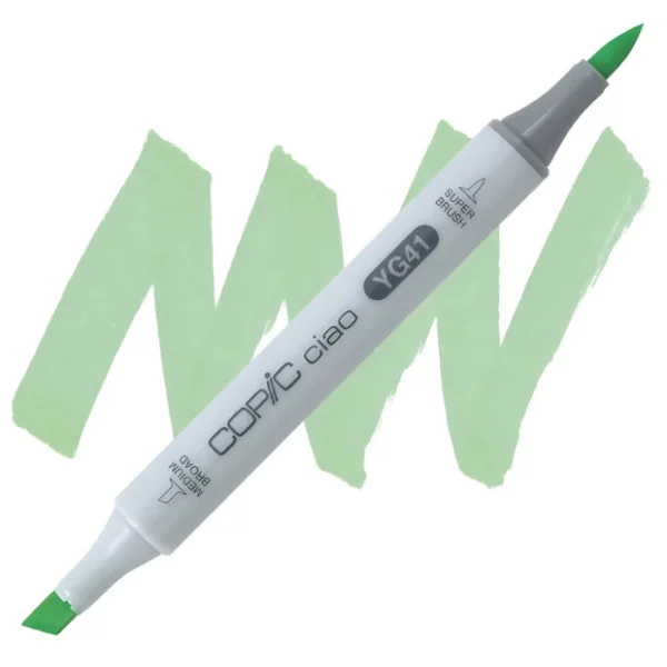 in the center of the image is a single copic marker that is sitting diagonally across the image. from left to right. it has a grey body and both caps are off showing the two different nibs, one brush at the top and the chisel tip at the bottom. it is sitting infront of a squiggle of the same colour as the marker on a white background