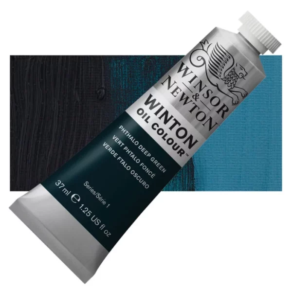 A tube of Phthalo Deep Green Winsor and Newton Winton Oil Paint 37ml is shown diagonally, across the center of the frame. The tube is a silver colour and has a white screw on, plastic lid. The Winsor and Newton logo is printed at the top of the tube and there is a white band printed across the tube, below the logo, that has the words 'Winton Oil Colour' written on it. Below that is a colour band printed across the tube that has black text describing the product colour and paint properties. There is a rectangular colour swatch behind the tube that shows the colour of the paint. It lays horizontally across the top third of the frame. The image is center of the frame and on a white background.