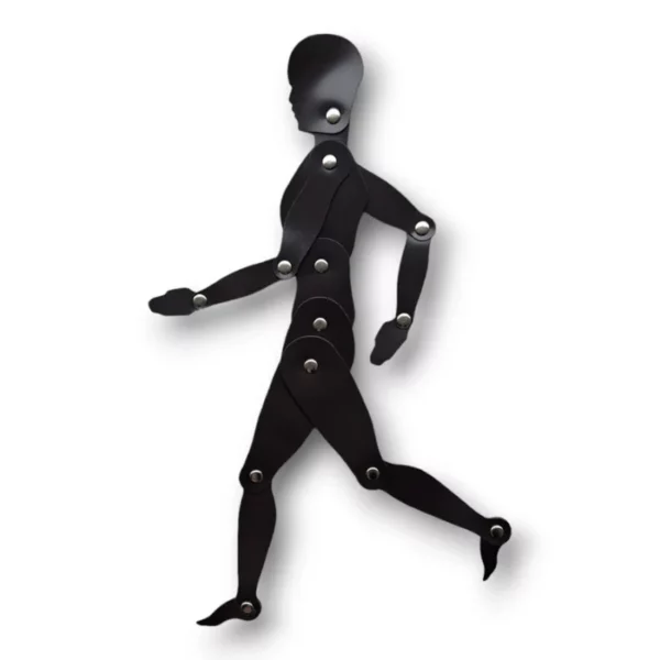 A single Prime Art 2-D Human Magnetic Manikin is shown in the center of the frame. The manikin is black with silver studded joints that allow it to move. The manikin is in a running pose, with it's hand astride and legs apart. It is a side profile of the manikin running. On a white background.