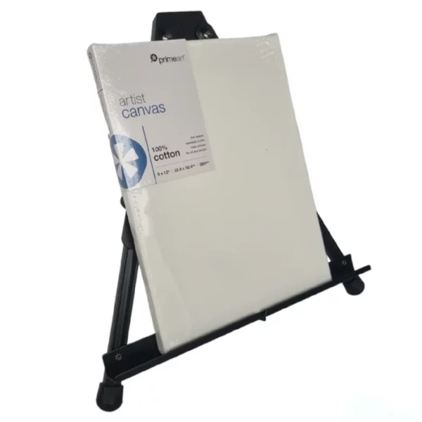 A single Prime Art Black Aluminum Table Easel is shown in the center of the frame. The easel is made of a black aluminum. It is an A Frame easel that is collapsible. The easel is shown holding a square, white, Prime Art canvas. On a white background.