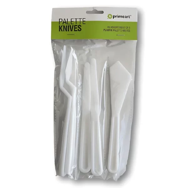 A Prime Art Plastic Palette Knife Set is shown in it's packaging in the center of the frame. The knives are in a clear plastic packet with a cardboard header that is printed with the Prime Art logo. You can see the 5 plastic palette knives through the packaging. Each white plastic palette knife has a different sized blade. On a white background.