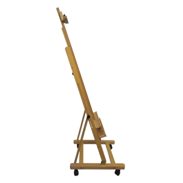 A single Prime Art Wooden Studio H-Frame Beech Easel with Wheels is shown in the center of the frame. It is a view of the side of the easel. The easel is made of a light beech wood and the castor wheels are black plastic. On a white background.