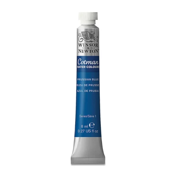 A single Prussian Blue Winsor and Newton Cotman Watercolour 8ml Tube is shown vertically in the center of the frame. The tube is silver and the Winsor and Newton logo is printed at the top of the tube. There is a blue band below the logo and the words 'Cotman Watercolour' are printed on the blue band in white. Then there is a large colour band around the base of the tube that denotes the colour of the paint. The tube colour and paint properties are indicated on this colour band in black text. The tube has a white, plastic screw on cap. The image is center of the frame and on a white background.