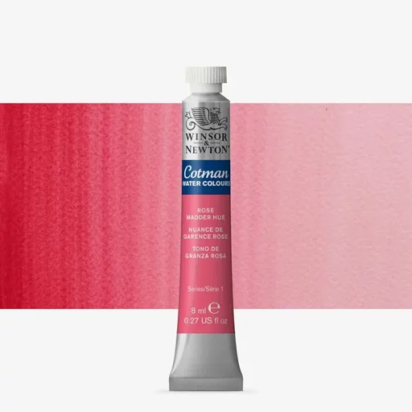 A single Rose Madder Hue Winsor and Newton Cotman Watercolour 8ml Tube is shown vertically in the center of the frame. The tube is silver and the Winsor and Newton logo is printed at the top of the tube. There is a blue band below the logo and the words 'Cotman Watercolour' are printed on the blue band in white. Then there is a large colour band around the base of the tube that denotes the colour of the paint. The tube colour and paint properties are indicated on this colour band in black text. The tube has a white, plastic screw on cap. There is a rectangular colour swatch behind the tube that shows how the colour works on a gradient scale. The entire image is center of the frame and on a white background.