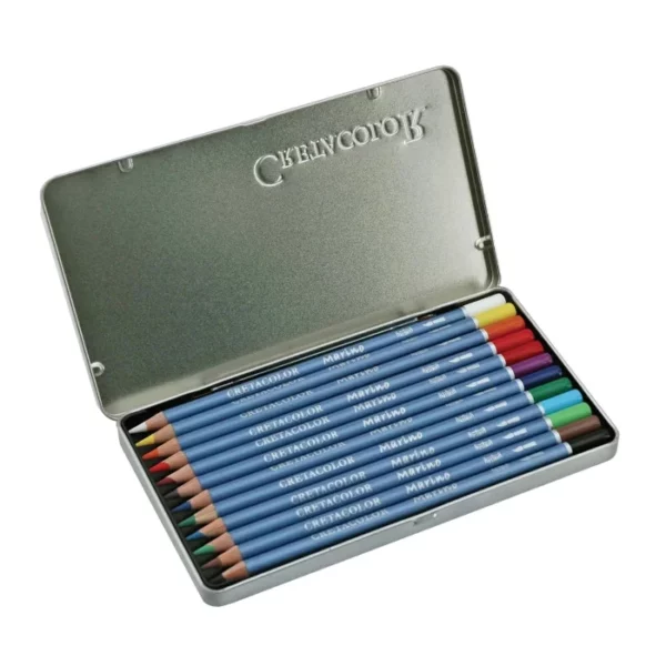 An open Set of 12 Cretacolor Marino Aquarelle Pencils is shown in the center of the frame at a slight angle. The hinged lid is open and you can see the pencils lined up next to each other in the base of the tin. The pencils have a blue barrel with the Cretacolor logo printed on them. The end of each pencil is dipped in a colour to denote the colour of the lead. On a white background.