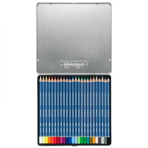 An open Set of 24 Cretacolor Marino Aquarelle Pencils is shown in the center of the frame horizontally. The hinged lid is open and you can see the pencils lined up next to each other in the base of the tin. The pencils have a blue barrel with the Cretacolor logo printed on them. The end of each pencil is dipped in a colour to denote the colour of the lead. On a white background.