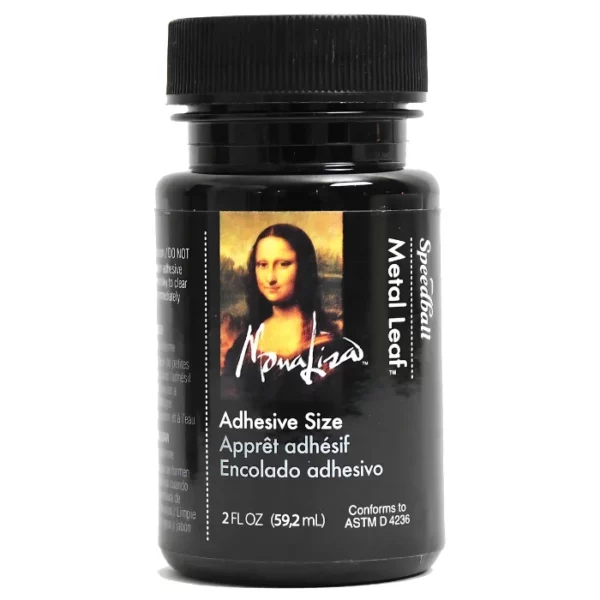 A single bottle of Speedball Gold Leaf Adhesive Size is shown in the center of the frame. The bottle is a black glass with a black plastic, screw on lid and a black printed label around the body of the bottle. The label has a picture of the Mona Lisa face on it and text describing the product. On a white background.