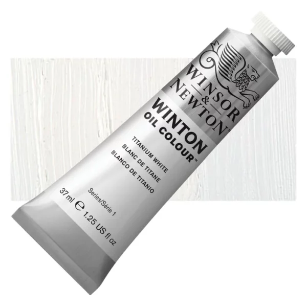 A tube of Titanium White Winsor and Newton Winton Oil Paint 37ml is shown diagonally, across the center of the frame. The tube is a silver colour and has a white screw on, plastic lid. The Winsor and Newton logo is printed at the top of the tube and there is a white band printed across the tube, below the logo, that has the words 'Winton Oil Colour' written on it. Below that is a colour band printed across the tube that has black text describing the product colour and paint properties. There is a rectangular colour swatch behind the tube that shows the colour of the paint. It lays horizontally across the top third of the frame. The image is center of the frame and on a white background.