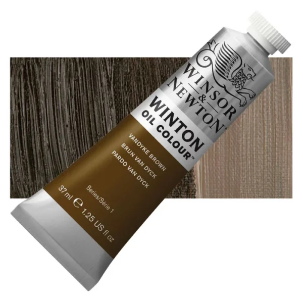 A tube of Vandyke Brown Winsor and Newton Winton Oil Paint 37ml is shown diagonally, across the center of the frame. The tube is a silver colour and has a white screw on, plastic lid. The Winsor and Newton logo is printed at the top of the tube and there is a white band printed across the tube, below the logo, that has the words 'Winton Oil Colour' written on it. Below that is a colour band printed across the tube that has black text describing the product colour and paint properties. There is a rectangular colour swatch behind the tube that shows the colour of the paint. It lays horizontally across the top third of the frame. The image is center of the frame and on a white background.