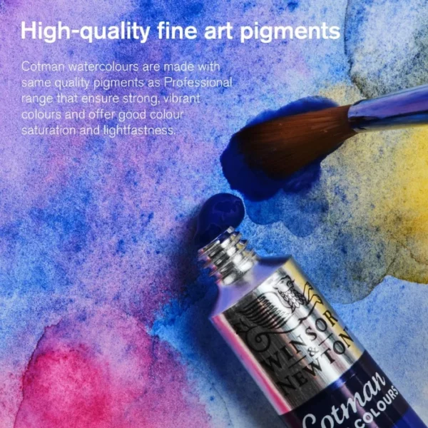 A promotional image for Winsor and Newton Cotman Watercolour Paints. A tube of paint and a brush are shown at the front of the frame, along the right hand side. They are laying on a piece of painted paper which has been painted in blues and pinks. There is white text at the top of the frame describing the high quality of the paints.