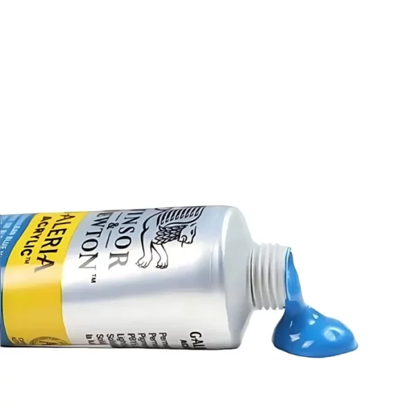 A single tube of Winsor and Newton Galeria Acrylic Paint is shown coming in from the left hand side of the frame. The tube is laying on its side / side profile shown. The cap is off and some blue paint is coming out of the tube. On a white background.