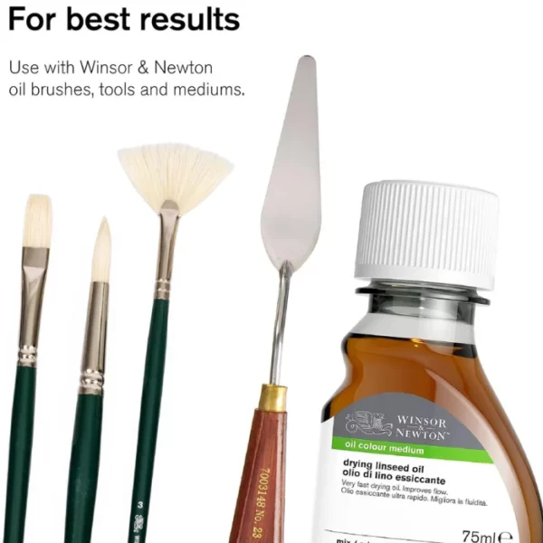 A promotional image for Winsor and Newton Winton Oil Paints. Three Winton brushes are shown on the left hand side of the frame, each brush has a different shape. There is a metal palette knife to the right of them, in the middle of the frame. The palette knife has a wooden handle and there is a bottle of Oil Medium along the right hand side of the frame. All these products are made by Winsor and Newton. There is text at the top of the frame which suggests that for best results with the oil paints, it is advised to use along side these Winsor and Newton tools and mediums. On a white background.