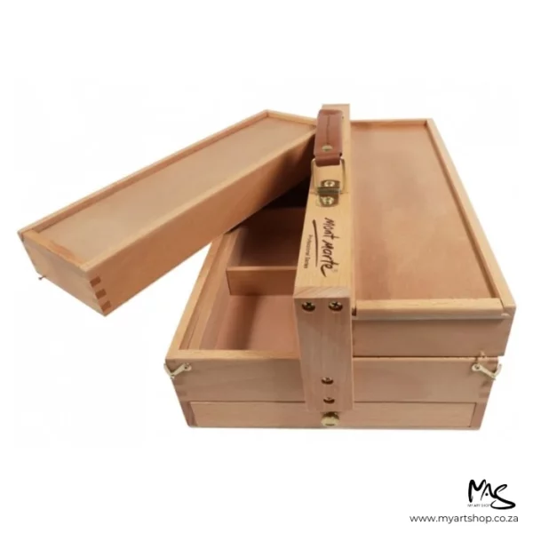 A single Mont Marte Signature Multi Purpose Art Box is shown in the frame, with one section of the box open. Showing a part of the storage. The box is wooden and is center of the frame on a white background.