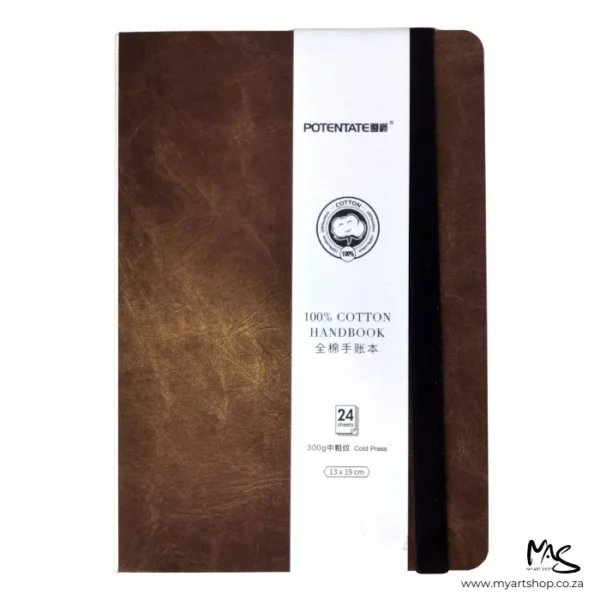 The image shows a Cold Press Potentate Watercolour Handbook with a Brown Cover from a front view. Showing the cover of the book which is brown and you can see the black elastic band that wraps around the book, along the right hand side of the book. The book is portrait and bound on the long side, which is along the left hand side of the frame. The book therefore sits vertically in the frame. The image is center of the frame and on a white background.