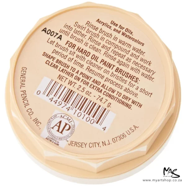 A birds eye view of the base of the tub of Masters Brush Cleaner and Preserver. The lid is round and beige in colour with dark brown text, describing the contents of the tub. On a white background.