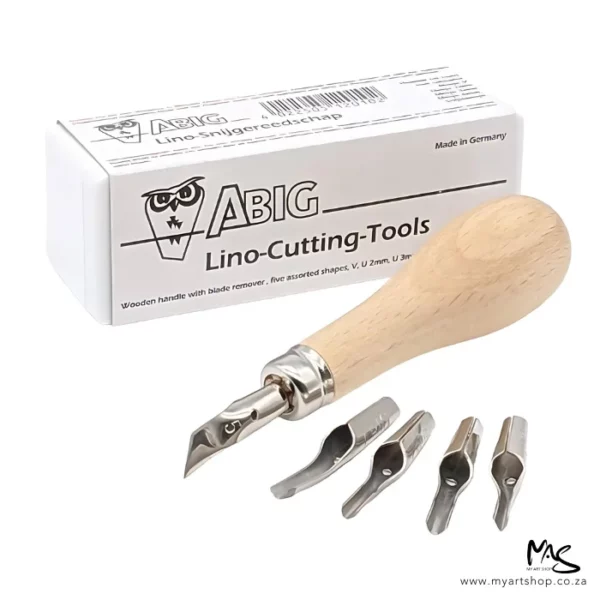 A set of ABIG Lino Cutting Tools is shown in the frame. The white box with black print that houses the set is shown in the background and the wooden handle is in front of the box, one blade is attached to the wooden handle. The remaining 4 blades are fanned out in front of the handle. The image is on a white background.