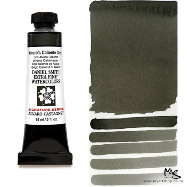 A tube of Alvaro's Caliente Grey S2 Daniel Smith Watercolour Paint is shown in the frame, to the left hand side of the frame vertically. The tube has a black plastic cap and a black base. The center of the tube is white and there is a colour band at the top of the tube, below the cap, that indicates the colour of the paint. There is black text on the front of the tube with the brand name and logo. To the right of the tube is a colour swatch which was made using the paint. In the colour swatch, you can see the paint undiluted and in a diluted form. The image is on a white background and is center of the frame.