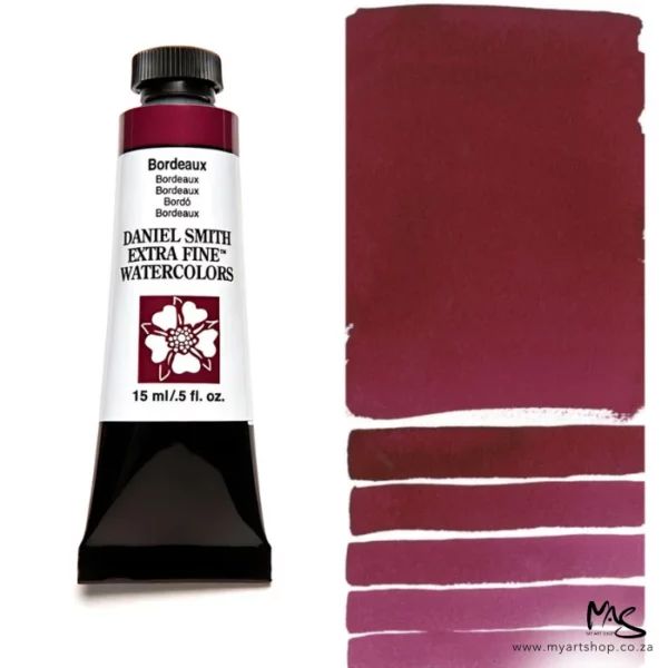A tube of Bordeaux S2 Daniel Smith Watercolour Paint is shown in the frame, to the left hand side of the frame vertically. The tube has a black plastic cap and a black base. The center of the tube is white and there is a colour band at the top of the tube, below the cap, that indicates the colour of the paint. There is black text on the front of the tube with the brand name and logo. To the right of the tube is a colour swatch which was made using the paint. In the colour swatch, you can see the paint undiluted and in a diluted form. The image is on a white background and is center of the frame.